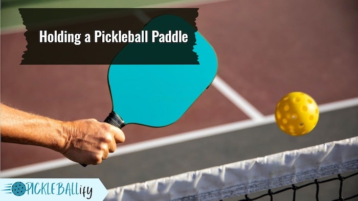 Holding a Pickleball Paddle Holding a Pickleball Paddle